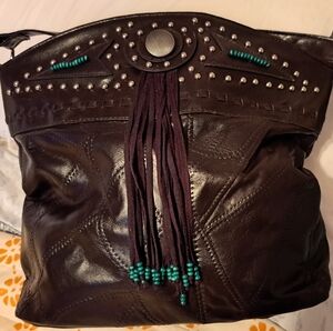 Elegant Black Leather Women's Bag with Turquise tassels. Inner Zipper closure